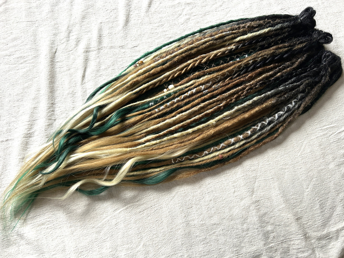 Livana Dreadlocks in green blonde and brown handmade synthetic dreads custom order Forest Feeling with curly ends