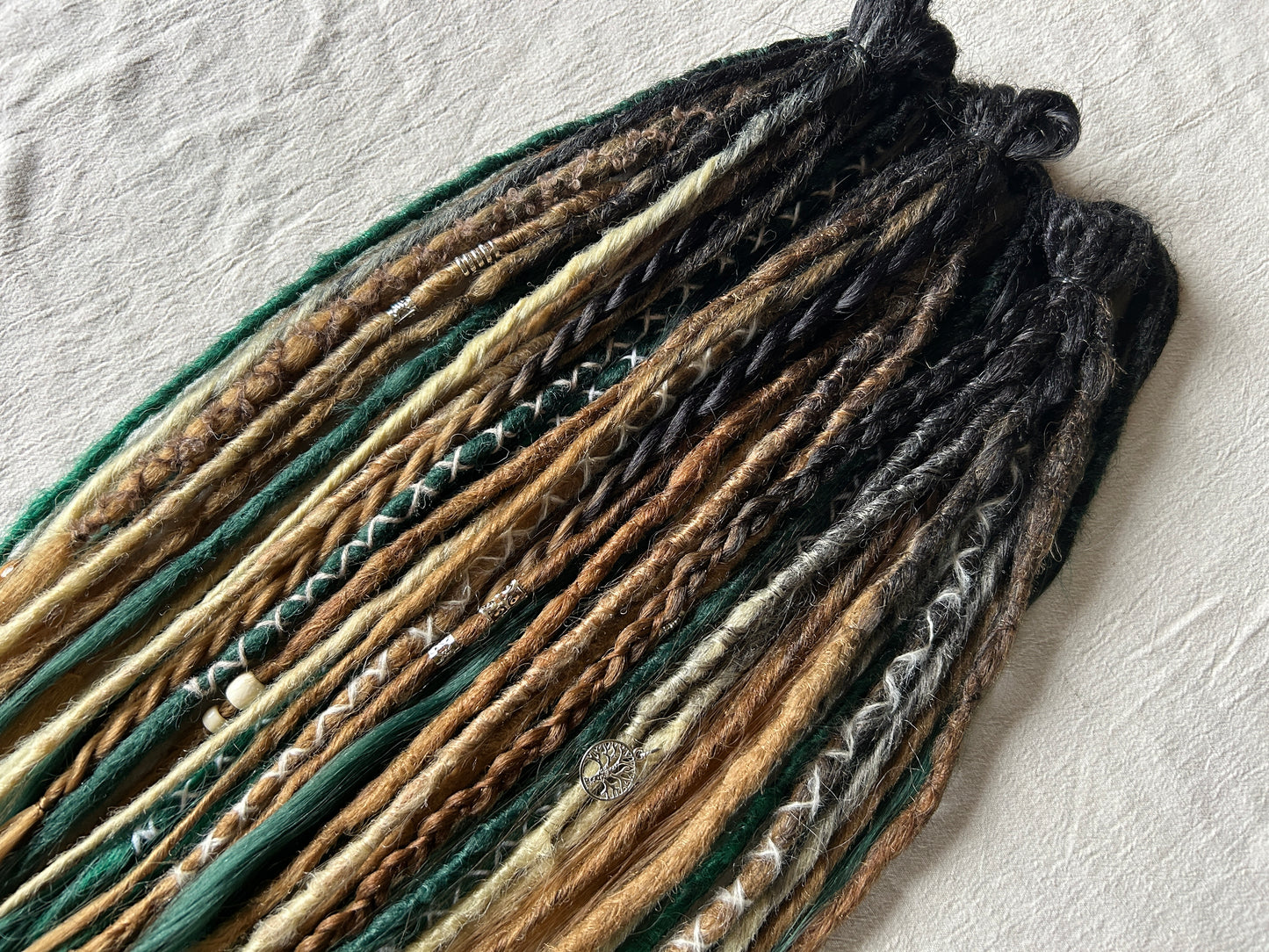 Livana Dreadlocks in green blonde and brown handmade synthetic dreads custom order Forest Feeling with curly ends