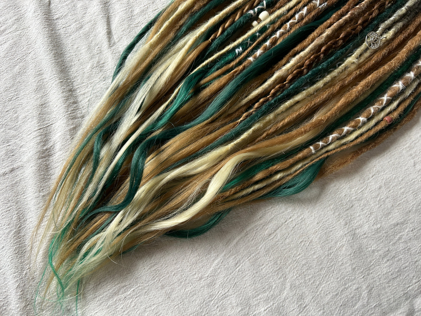 Livana Dreadlocks in green blonde and brown handmade synthetic dreads custom order Forest Feeling with curly ends