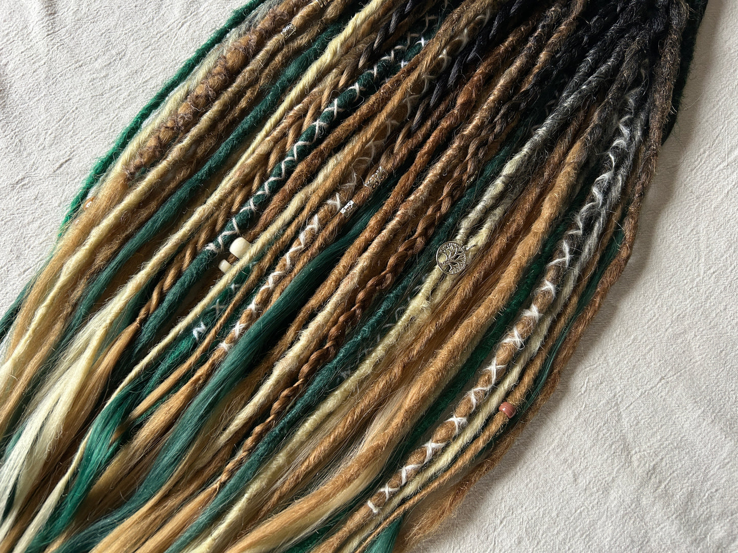 Livana Dreadlocks in green blonde and brown handmade synthetic dreads custom order Forest Feeling with curly ends